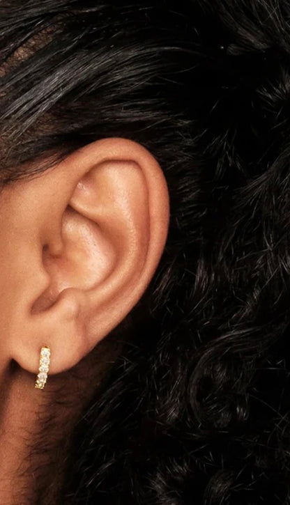 Small Hoops gold-plated. Pictured on a models ear